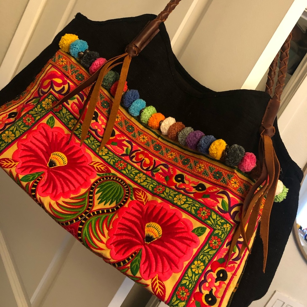 Fair trade embroidered tote with pom poms